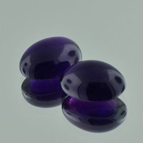Amethyst Pair Cabochons oval dark violet 31.53 ct