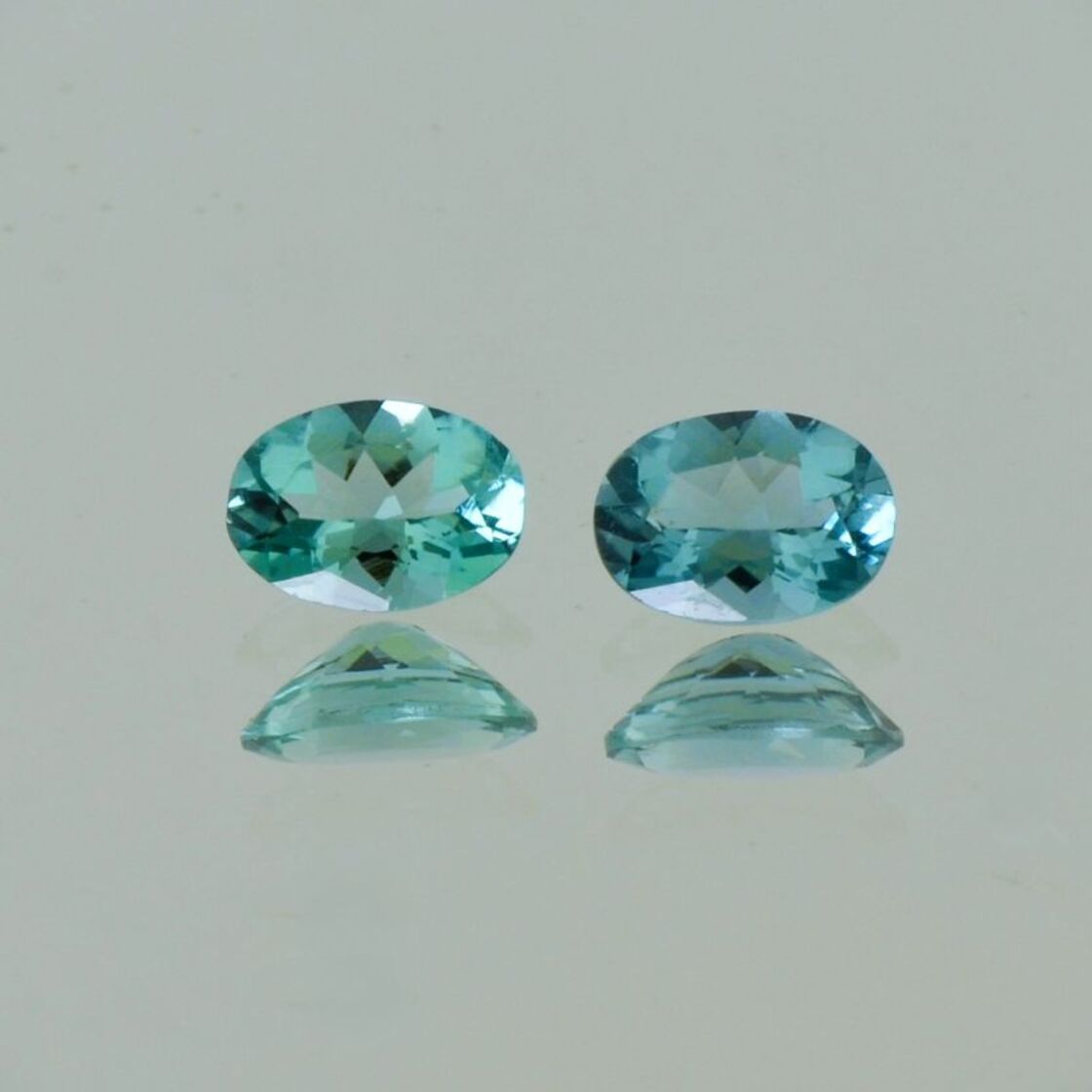 Indicolite Pair Tourmalines oval greenish blue 1.37 ct.