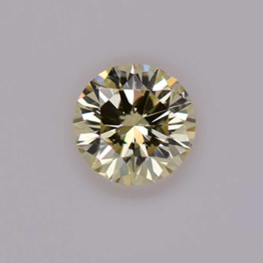 fancy diamond round brilliant champagne  si1 0.25 ct.