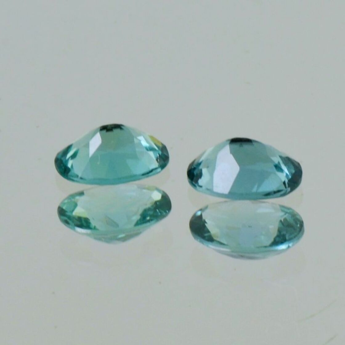 Indicolite Pair Tourmalines oval greenish blue 1.37 ct.