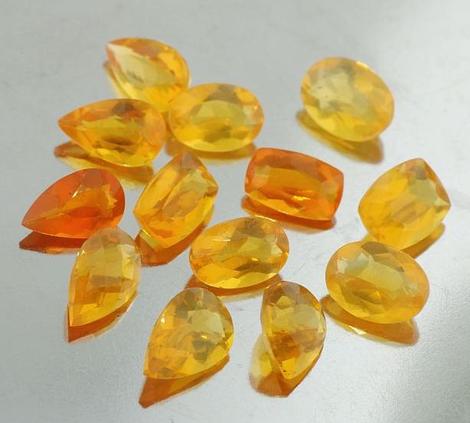 Feueropal Lot, Antik, Oval & Tropfen facettiert (14,47 ct.) aus Brasilien Feueropal Lot, Antik, Oval & Tropfen facettiert (14,47 ct.) aus Brasilien