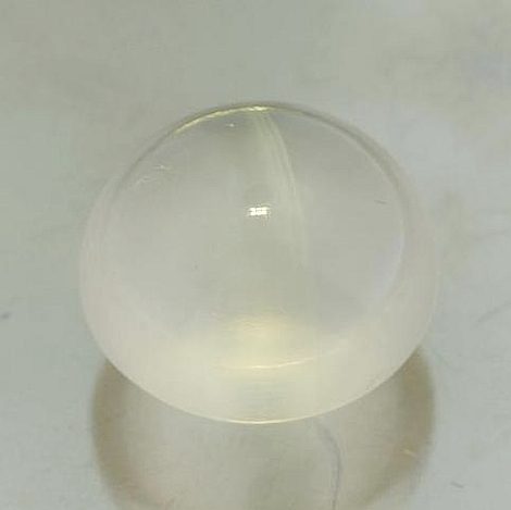 Katzenaugen-Quarz Cabo round 25.82 ct. Katzenaugen-Quarz Cabo round 25.82 ct.