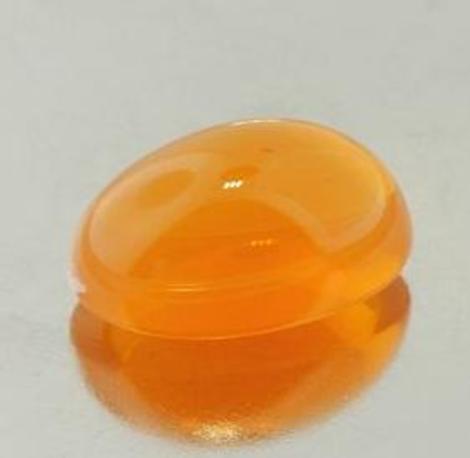 Feueropal, Oval Cabochon (8,52 ct.) aus Brasilien (Rio Grande do Sul) Feueropal, Oval Cabochon (8,52 ct.) aus Brasilien (Rio Grande do Sul)