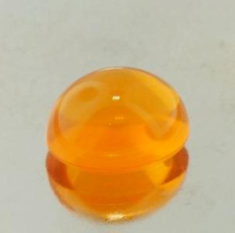 Feueropal, Oval Cabochon (6,57 ct.) aus Brasilien (Rio Grande do Sul) Feueropal, Oval Cabochon (6,57 ct.) aus Brasilien (Rio Grande do Sul)