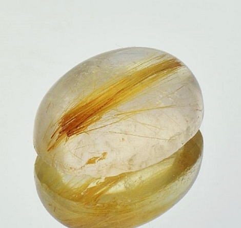Rutilquarz, Oval Cabochon (25,25 ct.) aus Brasilien Rutilquarz, Oval Cabochon (25,25 ct.) aus Brasilien
