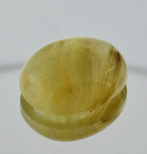 Rutilquarz, Oval Cabochon (18,00 ct.) aus Madagaskar Rutilquarz, Oval Cabochon (18,00 ct.) aus Madagaskar
