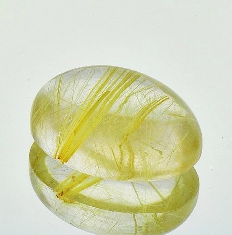 Rutilquarz, Oval Cabochon (21,21 ct.) aus Brasilien Rutilquarz, Oval Cabochon (21,21 ct.) aus Brasilien
