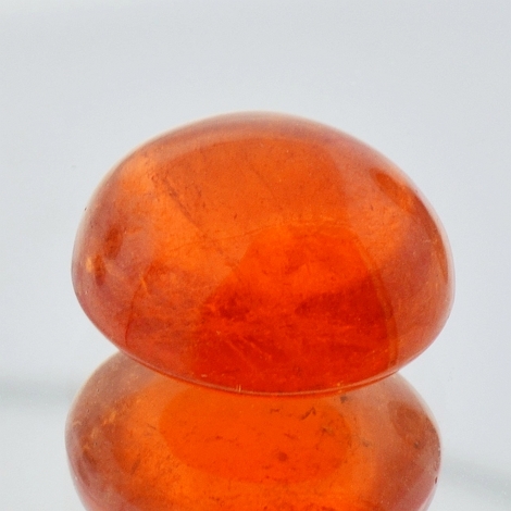 Mandarin-Granat, Oval Cabochon (21,58 ct.) aus Nigeria (Iseyin) Mandarin-Granat, Oval Cabochon (21,58 ct.) aus Nigeria (Iseyin)