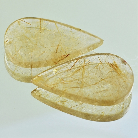 Rutilated Quartz Pair Tropfen-Tafelschliff 55.01 ct Rutilated Quartz Pair Tropfen-Tafelschliff 55.01 ct