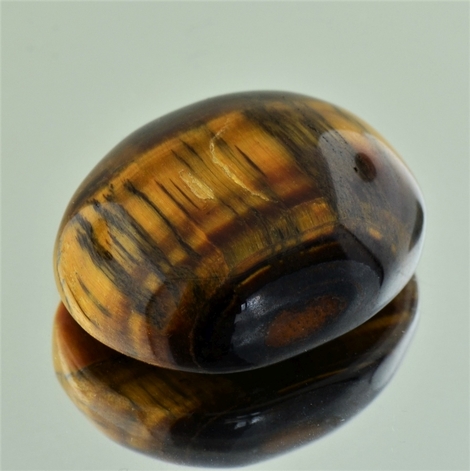 Tigerauge, Oval Cabochon (54,73 ct.) aus Namibia Tigerauge, Oval Cabochon (54,73 ct.) aus Namibia