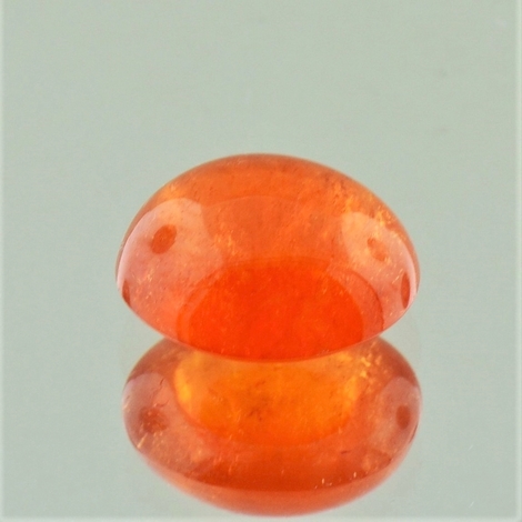 Mandarin-Granat, Oval Cabochon (7,03 ct.) aus Nigeria (Iseyin) Mandarin-Granat, Oval Cabochon (7,03 ct.) aus Nigeria (Iseyin)