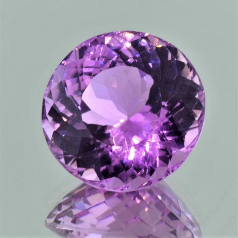 Kunzit, Rund facettiert (23,58 ct.) aus Afghanistan (Patroke Mine) Kunzit, Rund facettiert (23,58 ct.) aus Afghanistan (Patroke Mine)