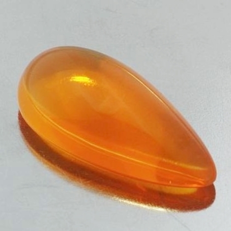 Feueropal, Tropfen Cabochon (9,60 ct.) aus Brasilien (Rio Grande do Sul) Feueropal, Tropfen Cabochon (9,60 ct.) aus Brasilien (Rio Grande do Sul)