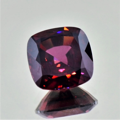 Zircon cushion dark red untreated 13.31 ct