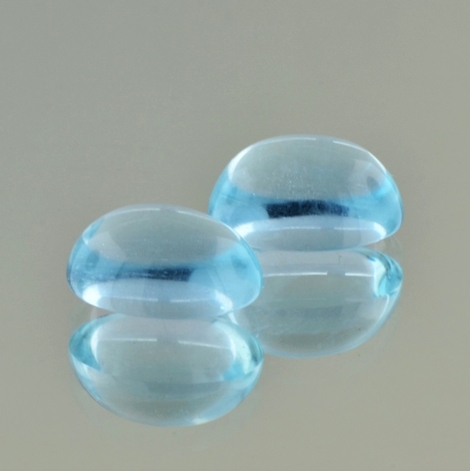Aquamarine Pair cabochon oval light blue 14.65 ct