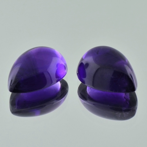 Amethyst Pair cabochon pear intense violet 23.01 ct