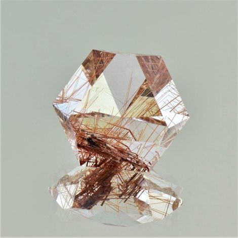 Rutilquarz, Design-Sechseck facettiert (21,68 ct.) aus Brasilien Rutilquarz, Design-Sechseck facettiert (21,68 ct.) aus Brasilien