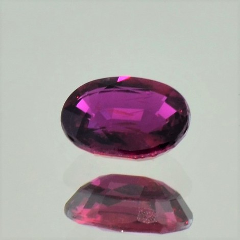 Ruby oval dunkles purple red unheated 1.50 ct