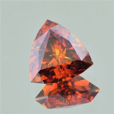 Sphalerite Design-Trillion reddish orange 11.41 ct