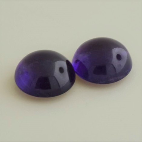 Amethyst Duo, Rund Cabochon (24,36 ct.) aus Sambia Amethyst Duo, Rund Cabochon (24,36 ct.) aus Sambia