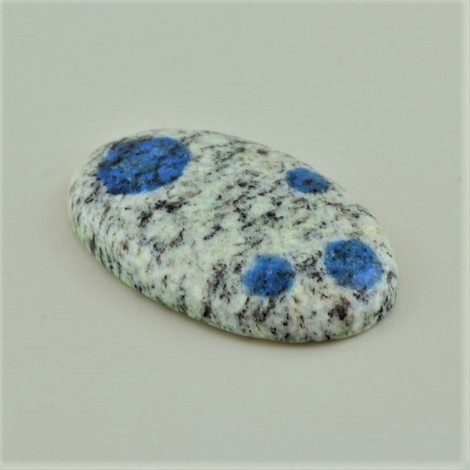 Granit-Azurit, Oval Cabochon (52,18 ct.) aus Pakistan (Gilgit, K2-Region) Granit-Azurit, Oval Cabochon (52,18 ct.) aus Pakistan (Gilgit, K2-Region)