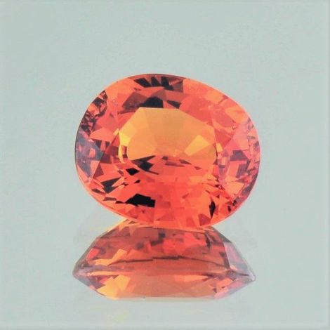 Mandarin Granat, Oval facettiert (4,91 ct.) aus Nigeria (Iseyin) Mandarin Granat, Oval facettiert (4,91 ct.) aus Nigeria (Iseyin)