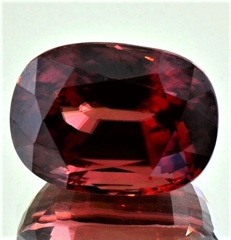 Zircon cushion reddish untreated 40.24 ct