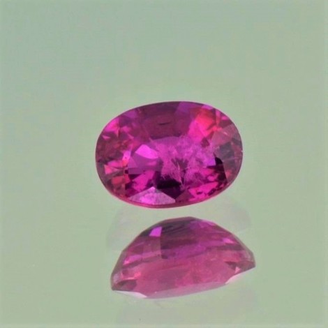 Ruby oval pinkish red unheated 1.17 ct.