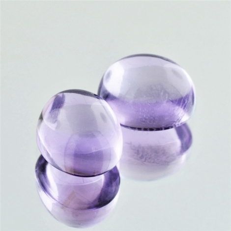 Amethyst Pair Cabochon oval 15 ct. Amethyst Pair Cabochon oval 15 ct.