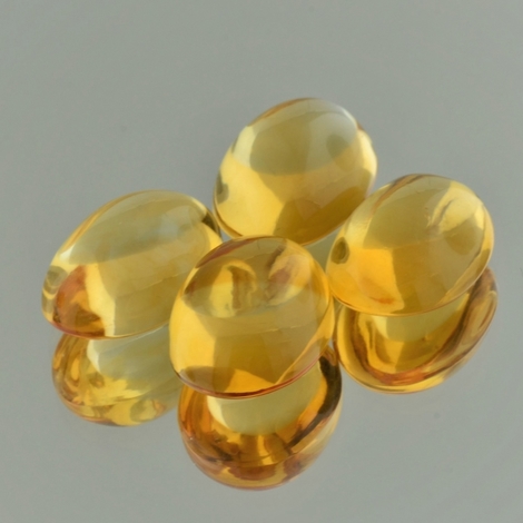 Citrin Lot, Oval Cabochon (51,23 ct.) aus Brasilien Citrin Lot, Oval Cabochon (51,23 ct.) aus Brasilien