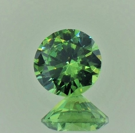 Demantoid Garnet round brilliant green 1.73 ct.