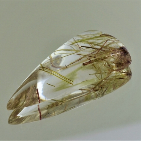 Einschluss-Quarz, Trillion Cabochon (40,35 ct.) aus Brasilien Einschluss-Quarz, Trillion Cabochon (40,35 ct.) aus Brasilien