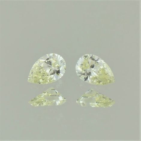 Fancy Diamond Pair pear yellow 0.48 ct