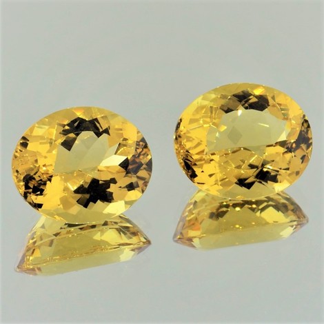 Golden Beryl Pair oval golden yellow 21.26 ct