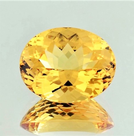 Imperial Topaz oval yellow orange untreated 21.37 ct.