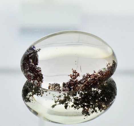 Einschluss-Quarz, Oval Cabochon (33,96 ct.) aus Brasilien Einschluss-Quarz, Oval Cabochon (33,96 ct.) aus Brasilien