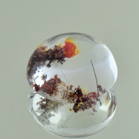 Einschlussquarz, Rund Cabochon (58,58 ct.) aus Brasilien (Minas Gerais) Einschlussquarz, Rund Cabochon (58,58 ct.) aus Brasilien (Minas Gerais)