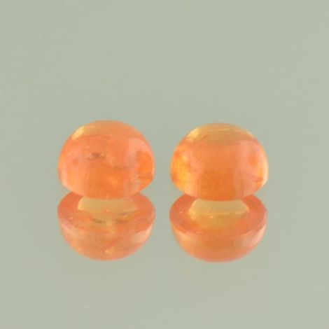 Mandarin Granat Duo, Rund Cabochon (2,93 ct.) aus Nigeria Mandarin Granat Duo, Rund Cabochon (2,93 ct.) aus Nigeria