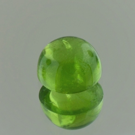 Peridot Cabochon rund grün 6,01 ct Peridot Cabochon rund grün 6,01 ct