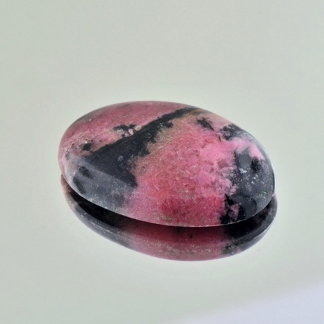 Rhodonit Cabochon oval 43,09 ct Rhodonit Cabochon oval 43,09 ct