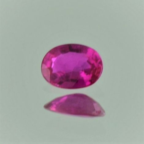 Ruby oval pinkish red 0.74 ct