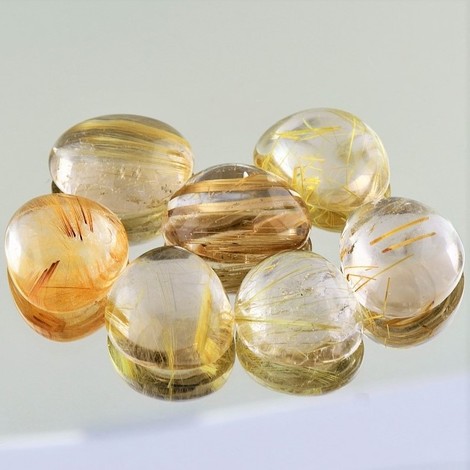 Rutilquarz Lot, Freiform Cabochon (135,87 ct.) aus Brasilien Rutilquarz Lot, Freiform Cabochon (135,87 ct.) aus Brasilien
