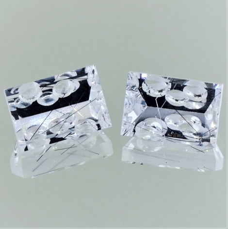 Einschlussquarz Duo, Rechteck facettiert (15,57 ct.) aus Brasilien (Minas Gerais) Einschlussquarz Duo, Rechteck facettiert (15,57 ct.) aus Brasilien (Minas Gerais)