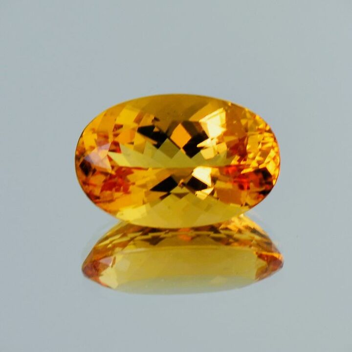 Imperial-Topas oval yellow orange untreated 13.68 ct.