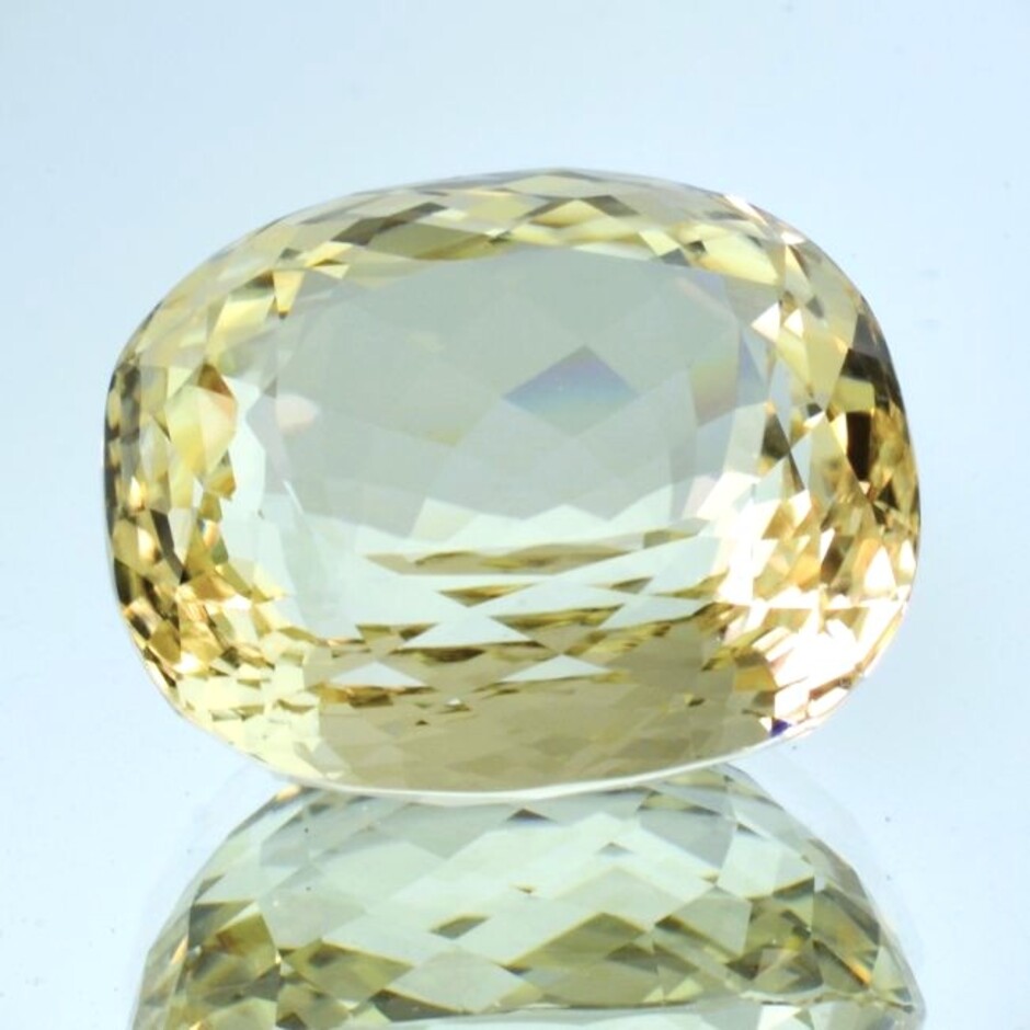 Hiddenit Spodumene cushion light yellow 134.45 ct.