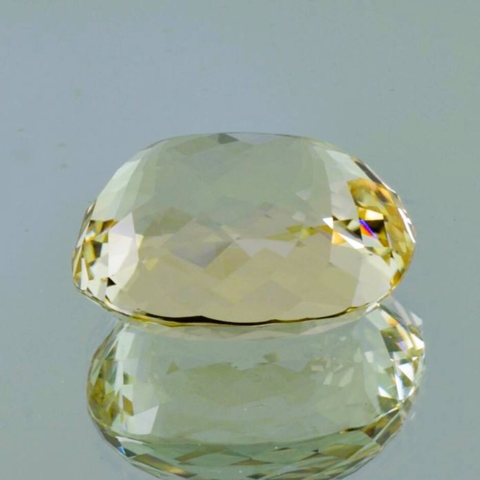 Hiddenit Spodumene cushion light yellow 134.45 ct.